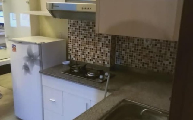 The Suites Metro Ananda Home