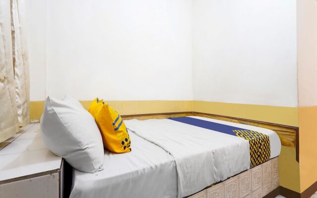 Spot On 91444 Hotel Arimbi