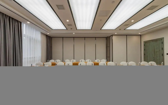 Rezen Hotel Wansheng International