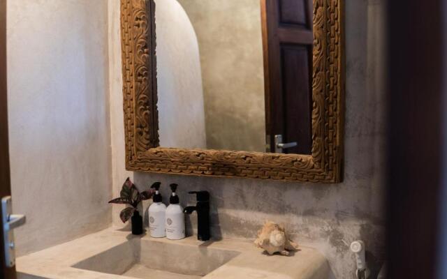 KIMA Serviced Beach House & Suites