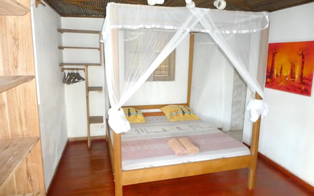 Bungalow With 2 Bedrooms in Andilana, With Wonderful sea View, Shared Pool and Enclosed Garden — фото 3