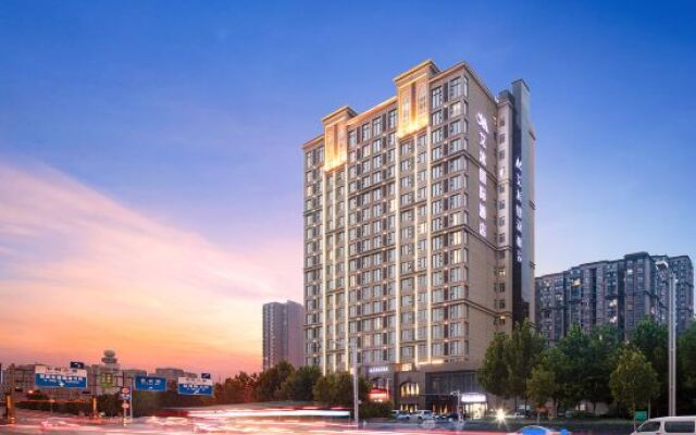 Aimu International Hotel (Zhengzhou East Railway Station Exhibition Center)