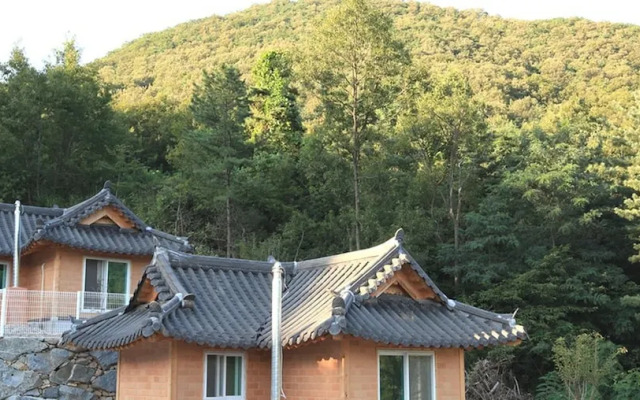Sanasa Red Clay House