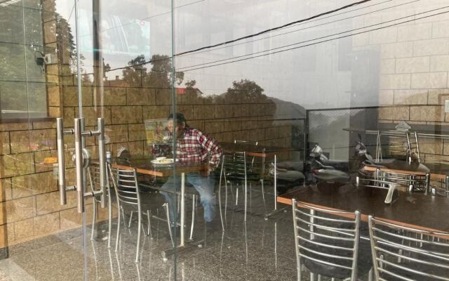 FabHotel Maya Civil Road