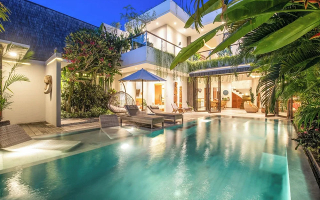 Luxury 4BR Haven, Steps to Canggu's Beach Elegance