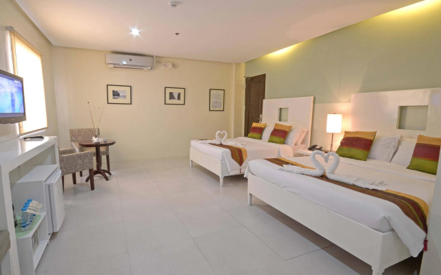 Holiday Suites Business District (Empire Suites Hotel)