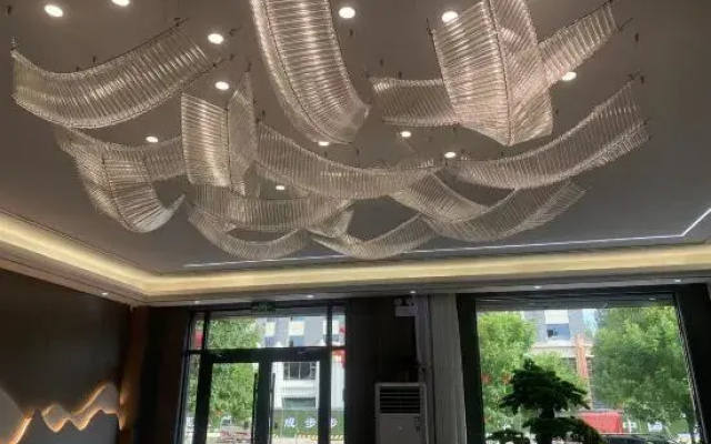 Xinle Shengjin Hotel