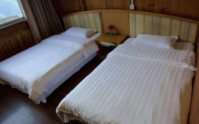 Guzhuang Family Hotel – Guest Rooms – Guilin