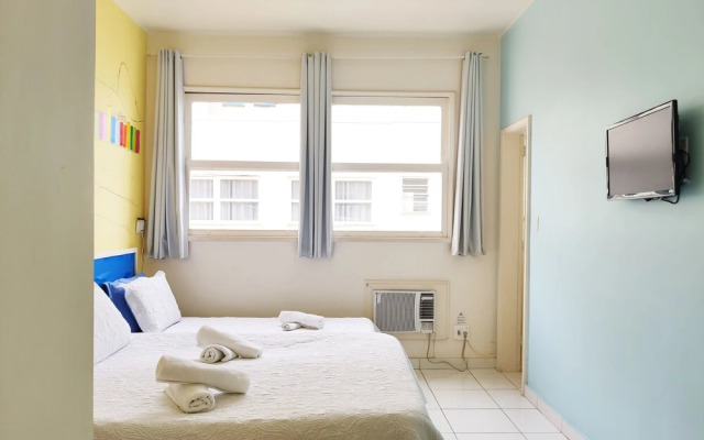 TC1206 Casal na praia de Copacabana