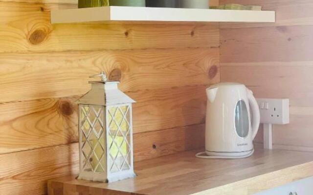 Log cabin retreat and luxury bell tent