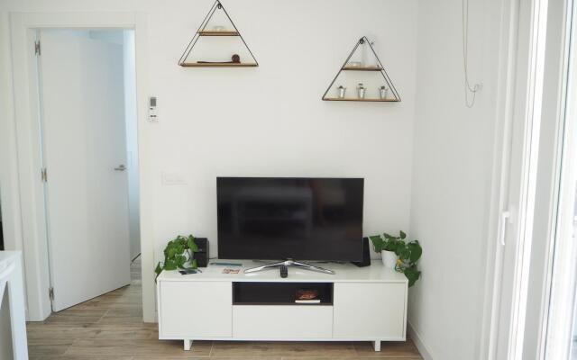 Apartament amb piscina i parquing.Baixos amb jardí