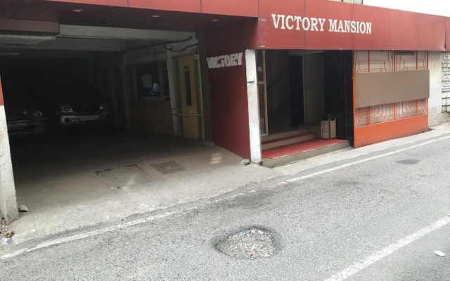 New Victory Mansion & Lodging by OYO Rooms