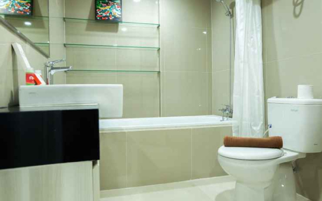 Studio Room Azalea Suites Apartment By Travelio