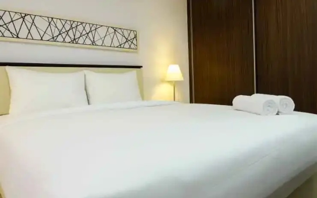 Studio Room Azalea Suites Apartment By Travelio