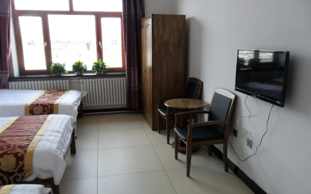 Yabuli Courtyard - Hotel in Charbin - Photo 4