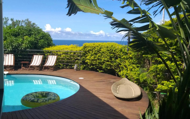 Suite INDIGO JACUZZI PRIVE PISCINE VUE MER acces cuisine laverie