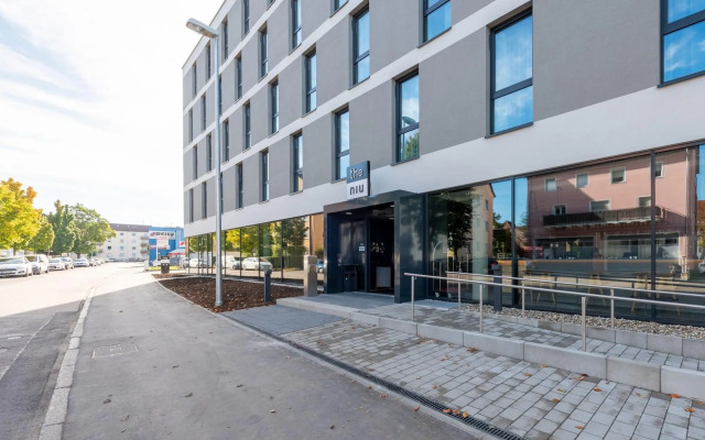 Отель Holiday Inn - the niu, Timber Esslingen, an IHG Hotel