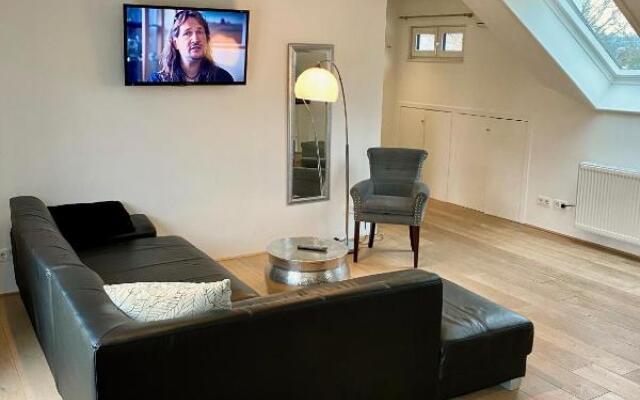 Luxuriöses Studio im Zentrum, Balkon, Kamin, Klima