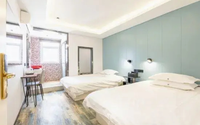 Pebble Motel (Shanghai Pediatric Hospital Lianhua Road Subway Station Branch)