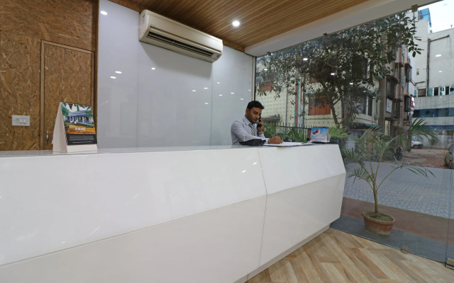 Capital O 7743 Hotel Hiland International