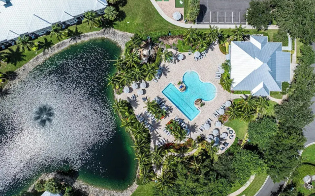 Asiago Vacation Rental at Lely Resort. Newly Furnished 2-Bedroom Condo with Stunning Lake & Golf Views. Spacious Retreat with Private Lanai, Resort Pool, Hot Tub and Gym Access