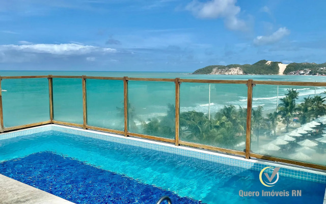 ES - Pé na areia em Ponta Negra