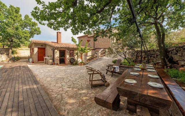 Stone house M&A with pool