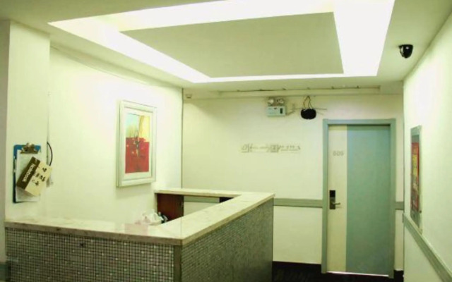 Xingyue Express Hotel (Xinxing Street Subway Station)