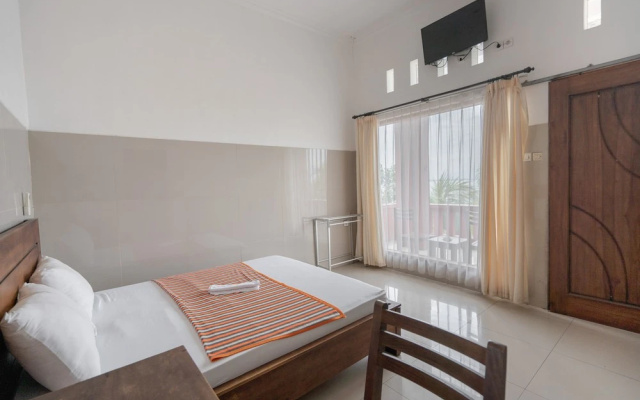 Rommeo Inn Lovina Mitra RedDoorz – Guest Rooms – Temukus