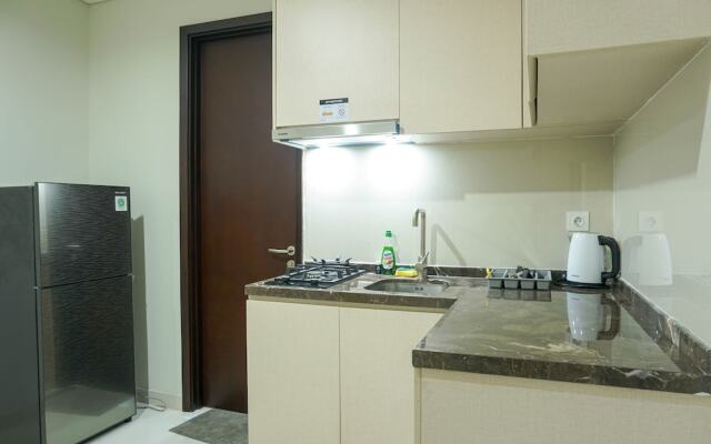 Strategic Location 1BR Apartment @ Puri Mansion near Puri By Travelio