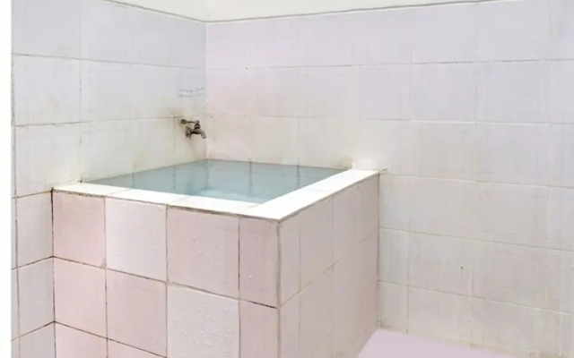 SPOT ON 90539 Taman Borobudur Guest House Syariah