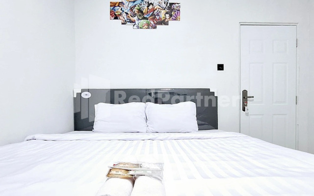 Aster Triplets Guest House JCM Mitra RedDoorz