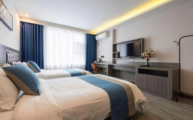 Jichu Hotel (Changsha Zhidili Plaza Xingsha Cultural and Sports Center Subway Station)