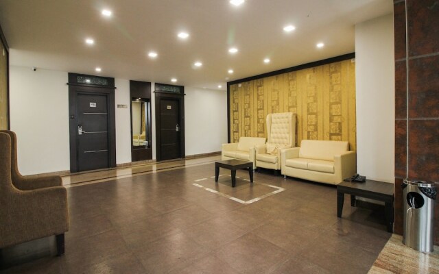 Capital O 15964 NI Ambaari Suites