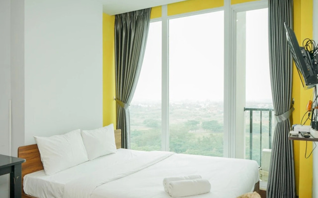 Homey Studio Room at Tree Park Apartment