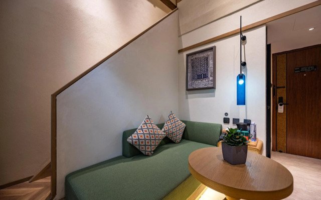 Qiuguo Hutong Courtyard Hotel