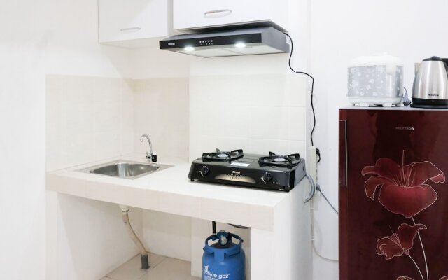 Homey 2Br At Puncak Permai Apartment