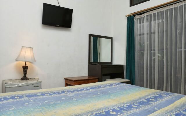 Rasa Sayang Beach Inn by RedDoorz