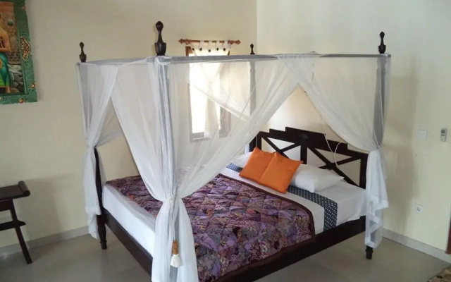Tradisi Beach Front Villas – Guest Rooms – Purwakerti