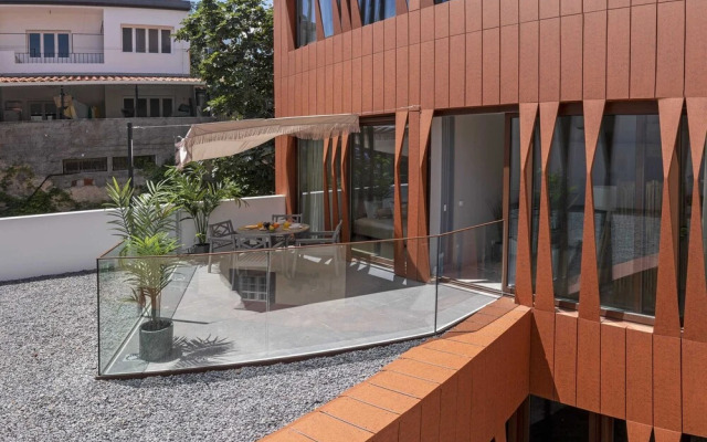 Cine Park Residence by An Island Apart