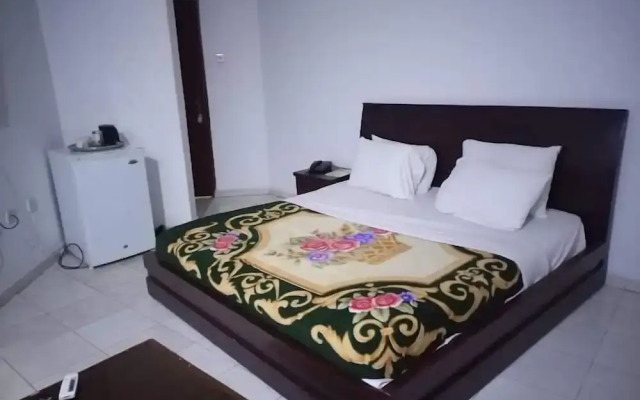 Quintessential Hotel & Suites by Badala