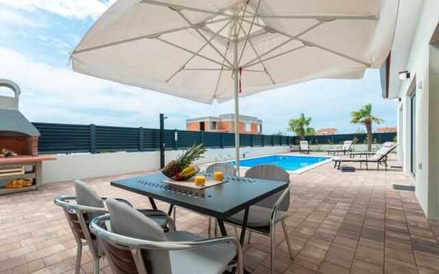 Luxury villa with pool near the beach 2