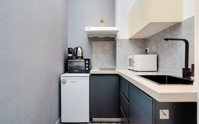 Sanders Home Suites - Cheerful Downtown Studio