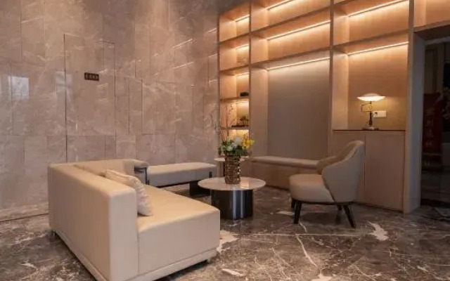 BaiLiQuanZhiJiuDian Hotel (Jiangmen Binjiang Sports Center)