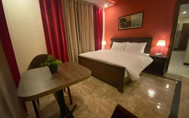 AK Hotel & Suites
