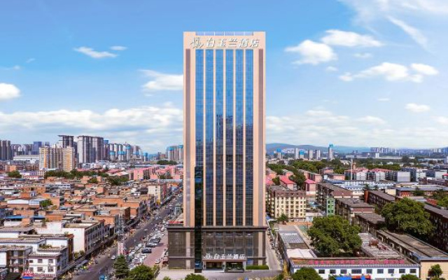 Magnotel Hotel (Luoyang Longmen Dadao Longmen High-Speed Rail Station) – Outside – Luoyang