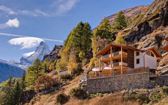Mountain Exposure Luxury Chalets & Penthouses & Apartments