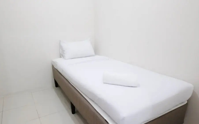 Modern And Homey 2Br At Puncak Kertajaya Apartment