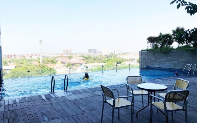 Compact Studio Room at Tamansari Papilio Apartment