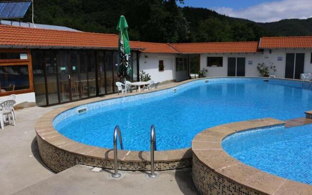 By the River Hotel Complex